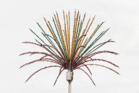 Decorative artificial palm street lamp in Kuala Lumpur.