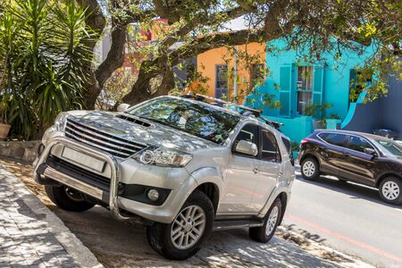 Silver off-road vehicle SUV in the Bo-Kaap district, Cape Town, South Africa.