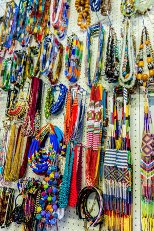 Colorful African bracelets, necklaces and jewelry in Bo-Kaap Cape Town.のeditorial素材