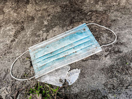 Surgical masks in nature. Corona virus pollution. Leherheide, Bremerhaven.の写真素材