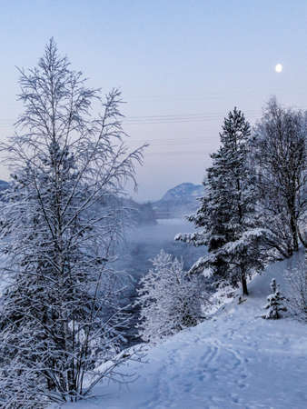 Night and moonlight over the mountains Snow and lakes in wintry Norway.