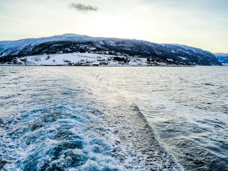 Take the ferry from Vangsnes to Dragsvik. Winter landscape and fjord in Norway.の写真素材