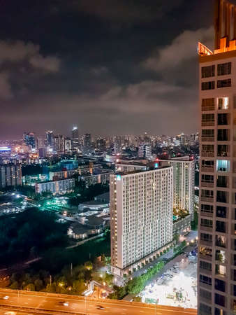 City panorama Bangkok by night. Skyscraper and cityscape of the capital of Thailand.のeditorial素材