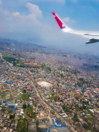 Kathmandu Nepal city seen from above through the airplane window.のeditorial素材