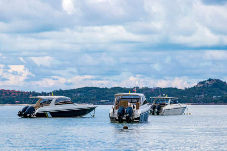 Bo Phut Beach with boats on Koh Samui island with view on Koh Pha-ngan, in Thailand.の写真素材