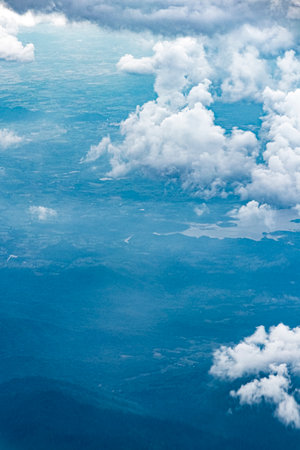 Flying above the beautiful clouds over the countryside of Thailand.の写真素材