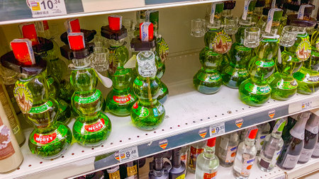 Green Hierbas Morey Dulces liqueur in the supermarket on Mallorca in Spain.