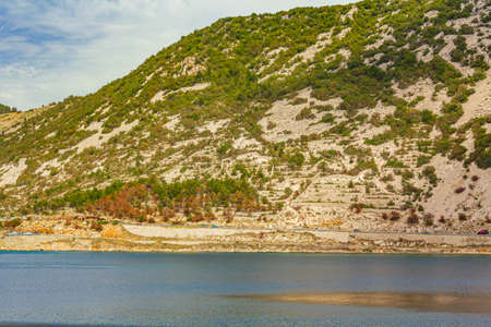 The blue bay and rocky hills of Bakarski zaliv in Bakar Croatia.の写真素材