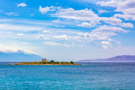 Novi Vinodolski and San Marino island with church in beautiful croatia.