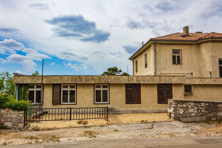 Old abandoned broken and dirty house building in Novi Vinodolski Croatia.の写真素材