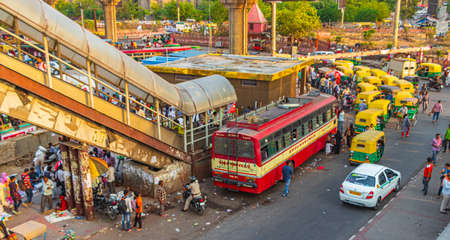 Life and big traffic with Tuk Tuks buses and people in New-Delhi Delhi India.のeditorial素材