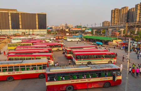 Life and big traffic with Tuk Tuks buses and people in New-Delhi Delhi India.