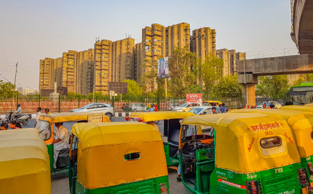 Life and big traffic with Tuk Tuks buses and people in New-Delhi Delhi India.のeditorial素材