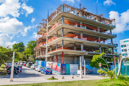 Huge hotel complexes are being built construction sites in Playa del Carmen Mexico.