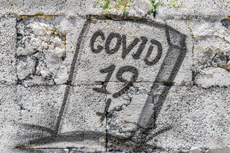 Artistic walls with COVID-19 gravestone cemetery paintings and graffiti in Playa del Carmen Quintana Roo Mexico.の写真素材