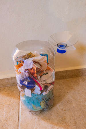 Creative trash can craft from big plastic bottle created in Mexico.