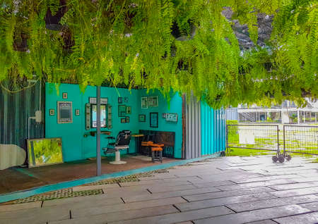 Empty turquoise hair salon and barber shop interior in Bangkok Thailand.のeditorial素材