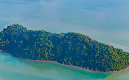 Flying over Thailand panoramic view of the beautiful islands coastal beaches turquoise waters and clouds.の写真素材