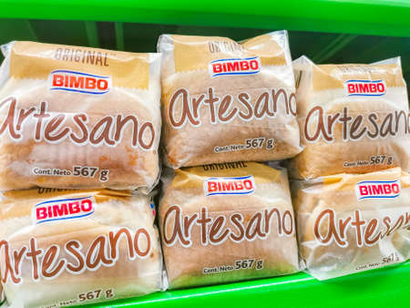 Playa del Carmen Mexico April 23, 2021 Bimbo white toast bread blanco original artesano and Doble Fibra packaging in the supermarket in Playa del Carmen Mexico.のeditorial素材