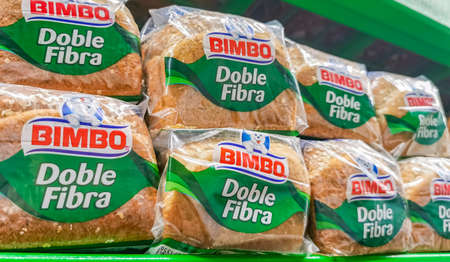 Playa del Carmen Mexico April 23, 2021 Bimbo white toast bread Doble Fibra packaging in the supermarket in Playa del Carmen Mexico.のeditorial素材