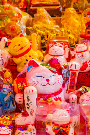 Bangkok Thailand May 22, 2018 Golden chinese cat souvenirs in souvenir shop store in Bangkok Thailand.