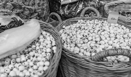 Selection of nuts and seeds in baskets Thai food and Chinese cuisine in street food old market in China Town Bangkok Thailand.の写真素材