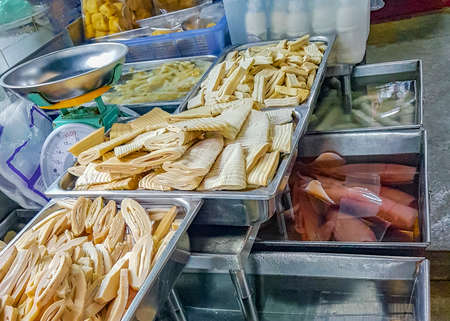 Disgusting unfamiliar Thai food and Chinese cuisine in street food market in China Town Bangkok Thailand.の写真素材