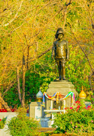 Green historic human sculpture statue in a natural park between green nature in Don Mueang Bangkok Thailand.の写真素材