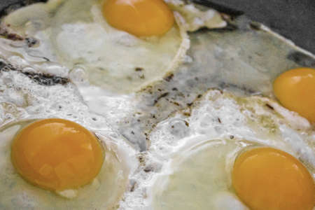 Fry eggs and make fried eggs in the pan in the morning.の写真素材