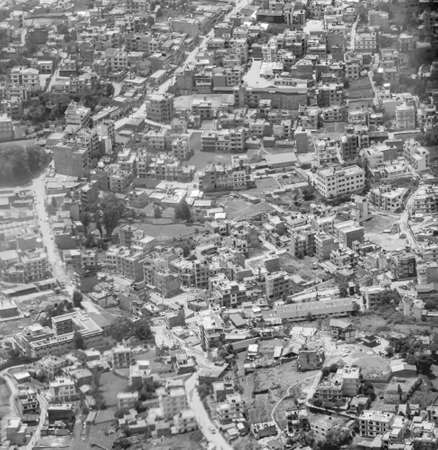 Kathmandu Nepal May 21, 2018 Black and white picture of Kathmandu Nepal city seen from above through the airplane window.の写真素材