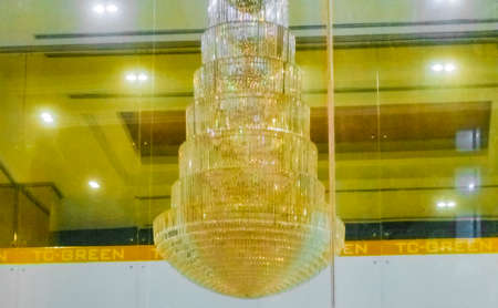 Amazing golden chandelier lamp in hotel TC-Green in Bangkok Thailand.のeditorial素材