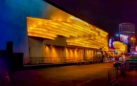 Nightlife and colorful lights at Onyx building in Bangkok Thailand.のeditorial素材