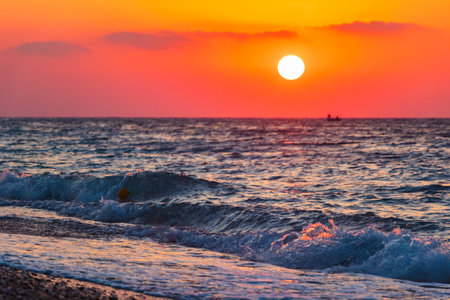 Rainbow colors of the most beautiful sunset at Ialysos Beach on Rhodes Island Greece.の写真素材