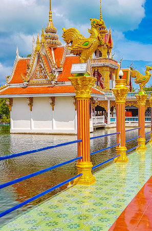 Colorful architecture lake and statues in Wat Plai Laem temple on Koh Samui island Surat Thani Thailandの写真素材