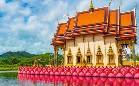 Colorful architecture lake and statues in Wat Plai Laem temple on Koh Samui island Surat Thani Thailandの写真素材
