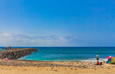 Tenerife Spain July 12, 2014 Landscape and beach promenade panorama of Playa del CamisÃ³n of Canary Spanish island Tenerife in Africa.のeditorial素材