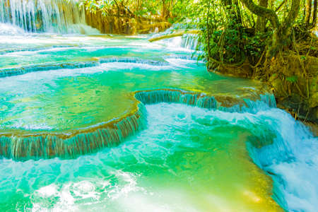 Worlds most beautiful waterfalls turquoise Kuang Si waterfall in Luang Prabang Laos.の写真素材