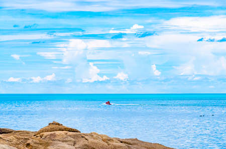Koh Samui island in Surat Thani Thailand and panoramic view of turquoise water and beach with unreal clouds formations.の写真素材