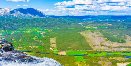 Amazing panorama view from top of the Hydnefossen waterfall and VeslehÃ¸dn Veslehorn mountain in...