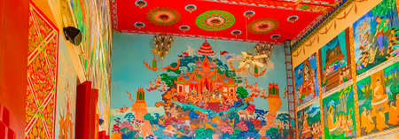 Colorful buddhist paintings galleries and art inside the Wat Plai Laem temple on Koh Samui island Thailandのeditorial素材