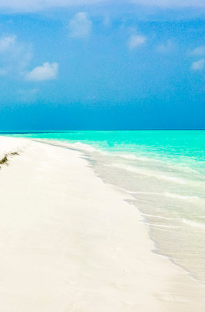 Color gradient at the sandbank islands Madivaru and Finolhu in Rasdhoo Atoll Maldives.の写真素材