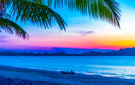 Rainbow colors of the most beautiful sunset at Tropical Paradise island Koh Phayam Ao Khao Kwai Beach in Ranong Thailand.の写真素材