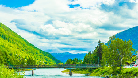 Amazing incredible norwegian landscape with bridge thru colorful mountains fjord and forests in Jotunheimen National Park Norway.の写真素材