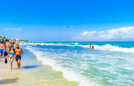 Playa del Carmen April 17, 2021 Tropical mexican beach landscape panorama full of people at beach parties on vacation in Playa del Carmen Mexico.のeditorial素材