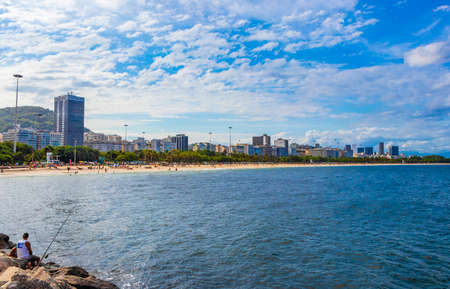 Rio de Janeiro Brazil 18. October 2020 People and tourist have fun on Flamengo Beach panorama view and cityscape at Guanabara Bay Flamengo Rio de Janeiro Brazil.のeditorial素材