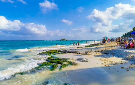 Playa del Carmen April 17, 2021 Tropical mexican beach landscape panorama full of people at beach parties on vacation in Playa del Carmen Mexico.のeditorial素材