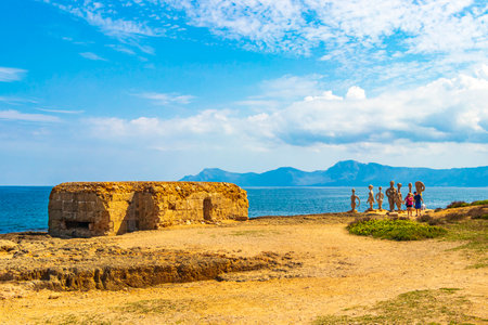 Mallorca Spain September 14, 2018 Stone sculptures and ruins in rough natural coastal and beach landscape panorama mountains rocks boulders stones in Can Picafort on Balearic island Mallorca in Spain.のeditorial素材