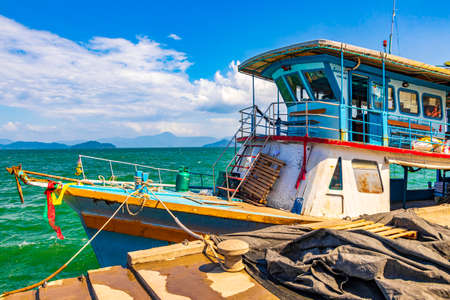 Ko Phayam Thailand February 01, 2020 Ferry boat at Tai Kak Pier and the tropical paradise sea...
