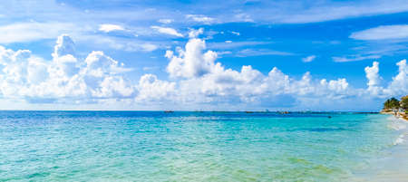 Tropical mexican beach panorama view with turquoise blue water from Playa 88 and Punta Esmeralda in Playa del Carmen Mexico.の写真素材