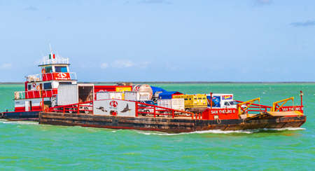Holbox Mexico December 21, 2021 Holbox Express car ferry from Holbox island in turquoise water in Quintana Roo Mexico.のeditorial素材